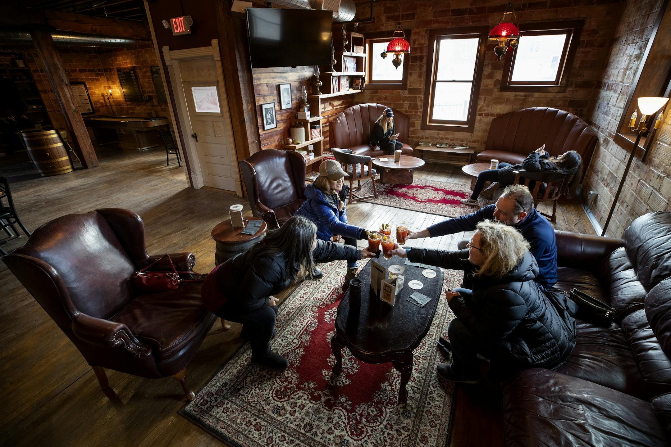 Patrons toasted each other at 10,000 Drops Craft Distillers in Faribault.