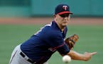 Minnesota Twins starting pitcher Tyler Duffey delivers to the Boston Red Sox in the first inning of a baseball game at Fenway Park, Thursday, July 21,