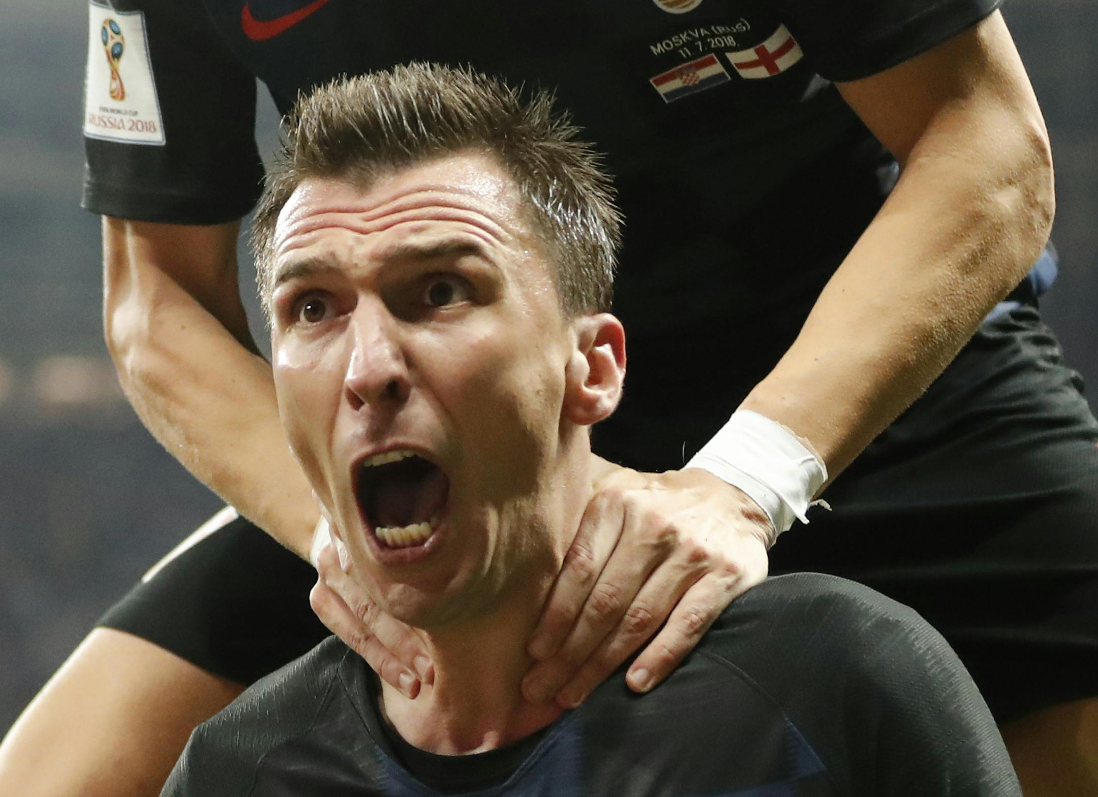 Croatia's Mario Mandzukic celebrates after scoring his side's second goal during the semifinal match between Croatia and England at the 2018 soccer World Cup in the Luzhniki Stadium in Moscow, Russia, Wednesday, July 11, 2018. (AP Photo/Frank Augstein)