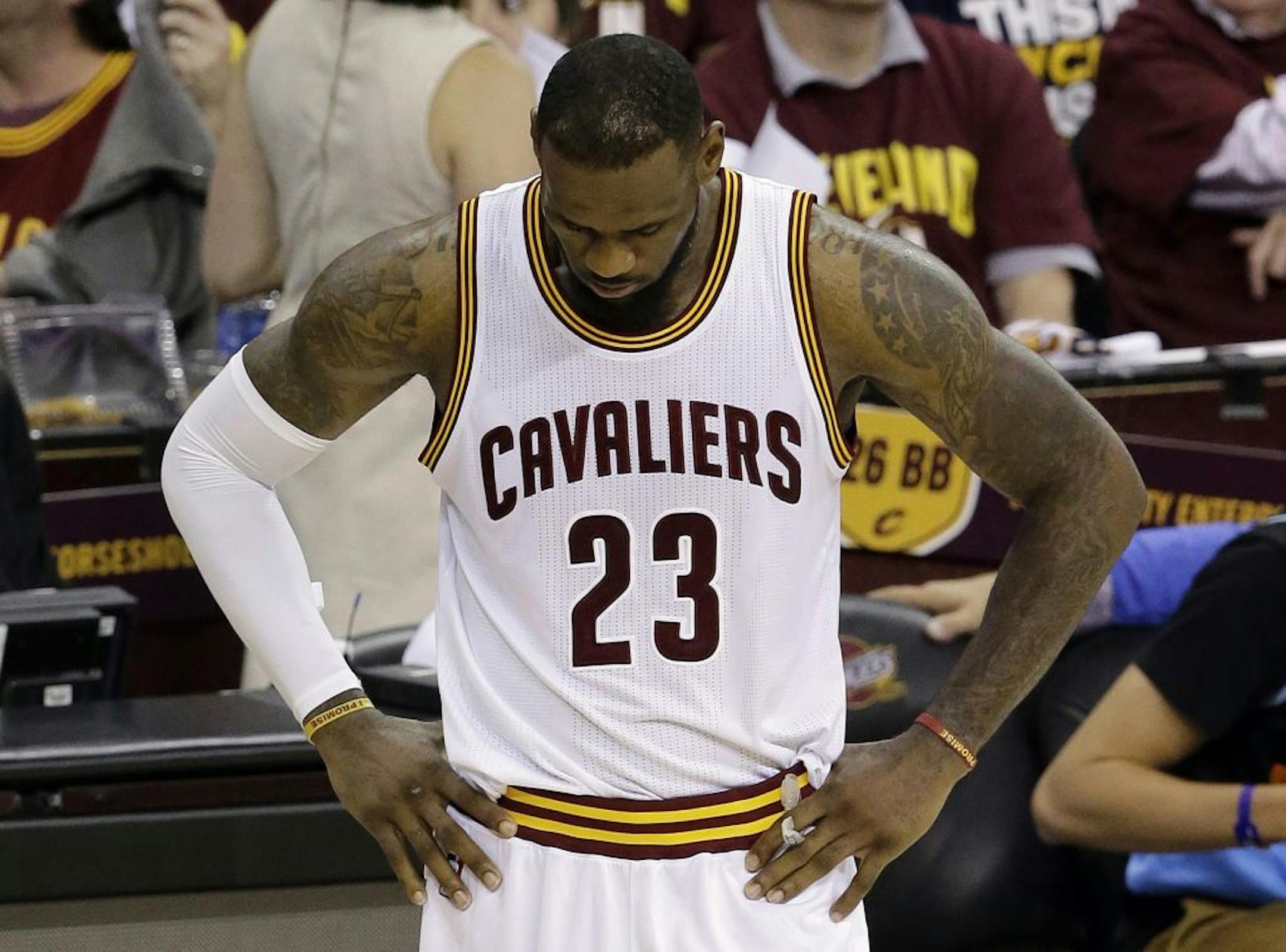 Cleveland Cavaliers forward LeBron James (23) hangs his heads during the second half of Game 6 of basketball's NBA Finals against the Golden State Warriors in Cleveland, Tuesday, June 16, 2015. The Warriors defeated the Cavaliers 105-97 to win the best-of-seven game series 4-2.