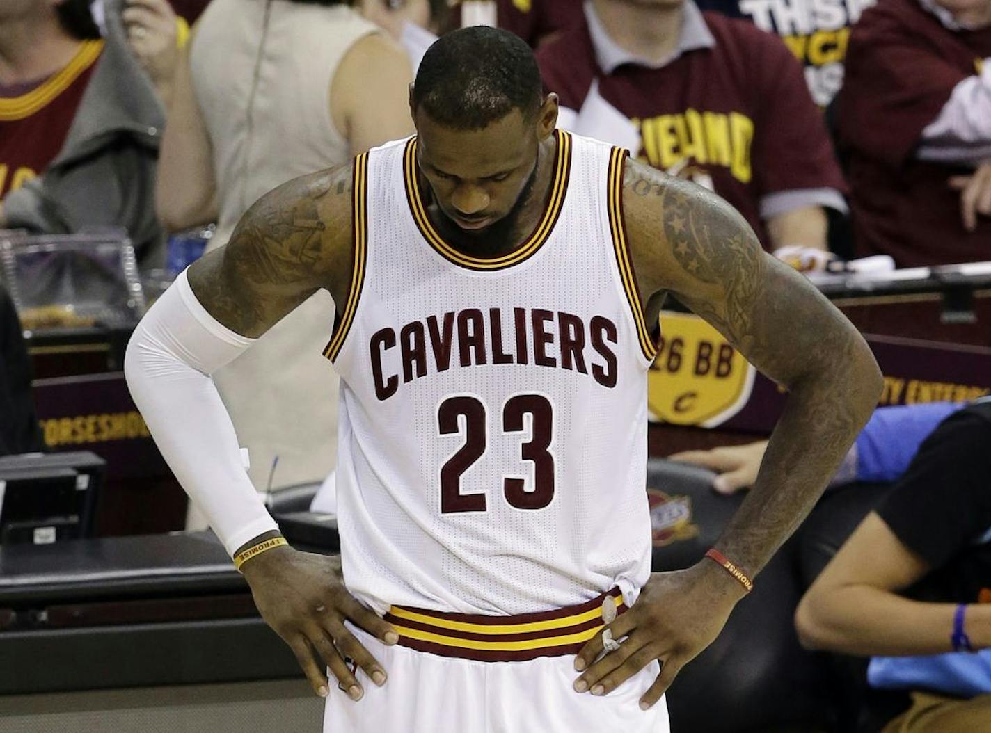 Cleveland Cavaliers forward LeBron James (23) hangs his heads during the second half of Game 6 of basketball's NBA Finals against the Golden State Warriors in Cleveland, Tuesday, June 16, 2015. The Warriors defeated the Cavaliers 105-97 to win the best-of-seven game series 4-2.