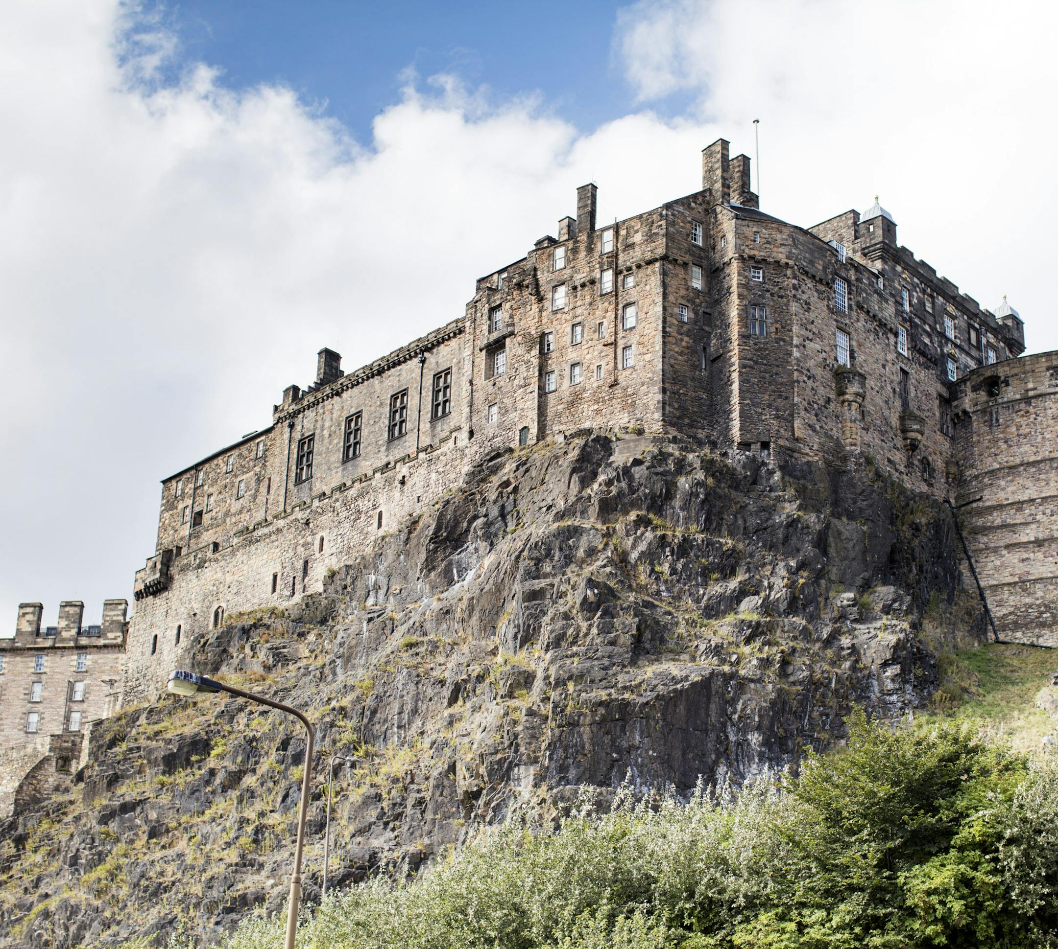 Edinburgh Castle looms above the Old Town district of the Scottish capital.