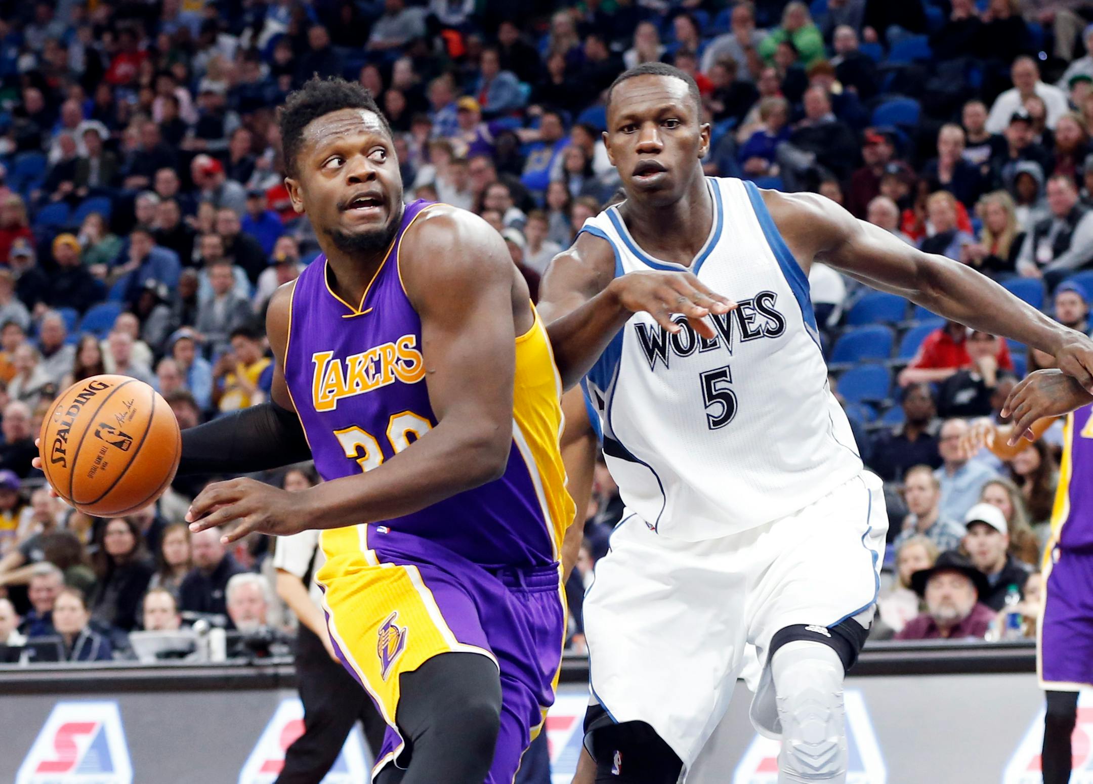 Sunday night was the second game between the Wolves and Lakers at Staples Center in little more than three weeks and the third overall in that time. The teams played March 30 at Target Center, when the Lakers' Julius Randle, left, drove to the basket against the Wolves' Gorgui Dieng.