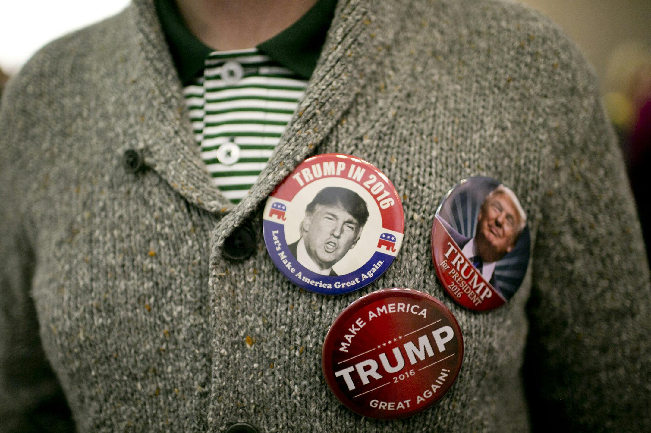 A button-wearing Donald Trump supporter at a campaign rally in Columbus, Ohio, Nov. 23, 2015. Trump’s heated campaign rhetoric has both fired up his supporters and drawn more protesters, resorting in a number of scuffles at rallies which he has mostly embraced as a new and action-packed dimension of the Donald Trump experience. (Andrew Spear/The New York Times) ORG XMIT: MIN2015121113154322