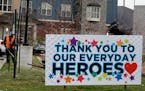 A sign thanking essential workers is displayed at Aspired Living of Prospect Heights in Prospect Heights, Ill., April 22, 2020.