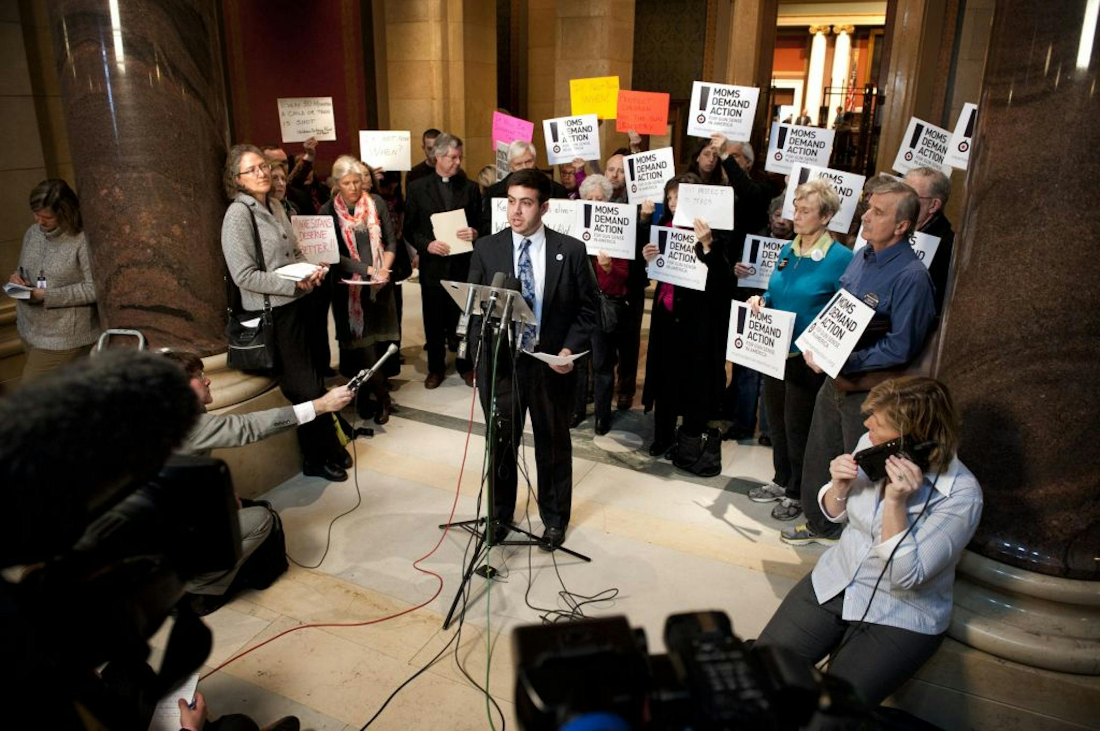 Sami Rahamim, son of the owner of Accent Signage who was killed in a shooting last year spoke at a press conference at the State Capitol on Friday, May 3. The Minnesota Gun Violence Prevention Coalition asked the Minnesota House to act on background check legislation for gun sales. House Speaker Paul Thissen previously announced that a deal wasn't possible this year.