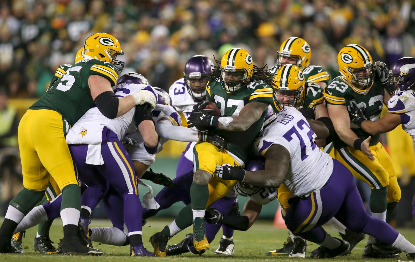 Packers running back Eddie Lacy (27) was stopped by Vikings defensive tackle Kenrick Ellis (72) on a four yard run in the third quarter when the Vikings and Packers played in January.