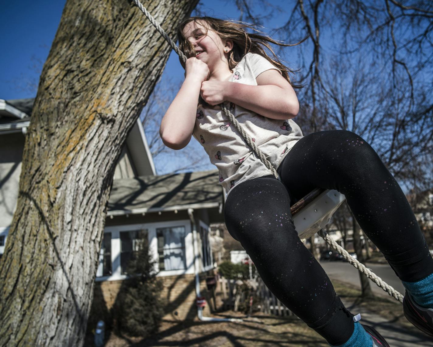 Sophie Jones,8, took to new heights in the swing that her granpa Bill built for her. Mom Kristin assisted in sending her daughter up, up, and away. The family is sid to be leaving their favorite swing tree on Lyndale Avenue South in Minneapolis as they move to another neighborhood.]Temperatures expected to rise to the 60's in the Twin Cities as ice and snow melt away.Richard Tsong-Taatarii&#xef;rtsong-taatarii@startribune.com