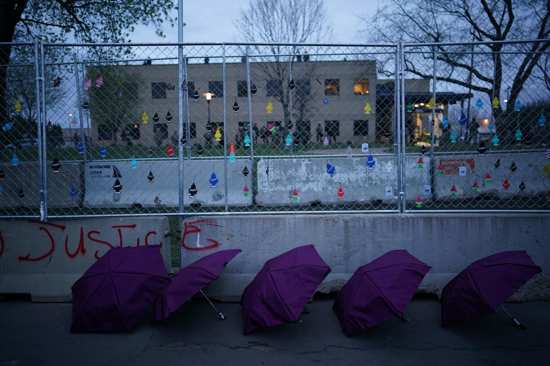 Umbrellas were open ready next to the barricade. Demonstrators gathered for a protest near the Brooklyn Center Police Department on Thursday, April 15, 2021 in response to the fatal police shooting of Daunte Wright in Brooklyn Center, Minn.