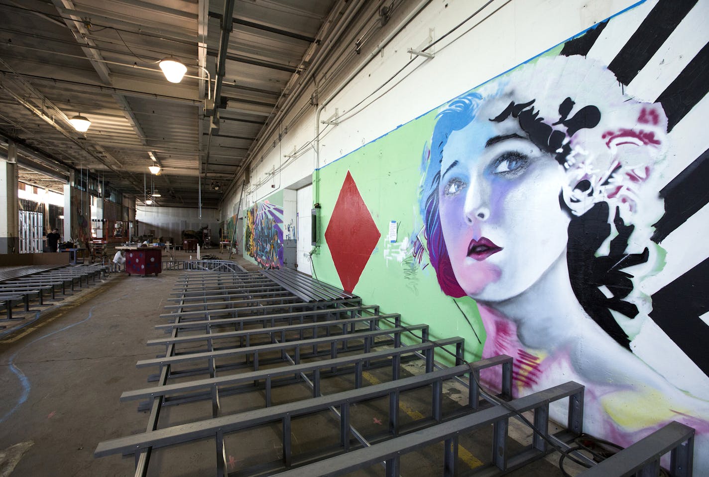 The massive indoor golf space will have a raised water feature and graffiti art by the Heavy Metal crew. ] (Leila Navidi/Star Tribune) leila.navidi@startribune.com BACKGROUND INFORMATION: Thursday, June 16, 2106 in St. Paul. Can Can Wonderland is a massive indoor mini golf course slated for the old American Can factory in St. Paul's Midway neighborhood.