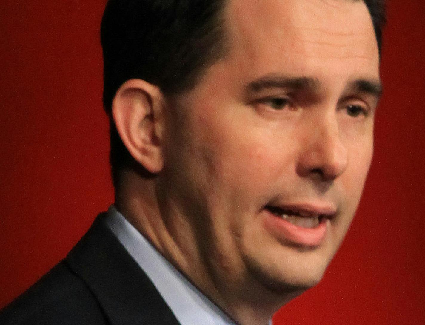 Wisconsin Gov. Scott Walker delivers an address at a fundraising event for the Iowa GOP on Thursday, May 23, 2013 at the Sheraton Hotel in West Des Moines, Iowa. (AP Photo/The Des Moines Register, Charlie Litchfield) ORG XMIT: MIN2013060817381674