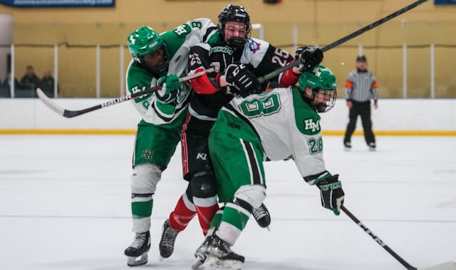 Hill-Murray’s Simon Seidl and Casper Lang (28) converged on Gentry Academy’s Quinn O’Connor during Friday’s game.