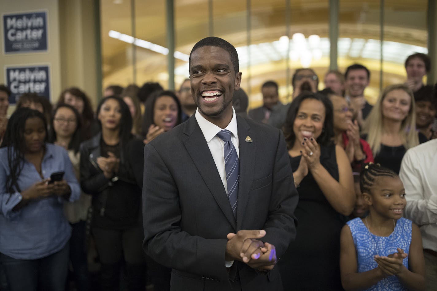 St. Paul mayoral candidate Melvin Carter celebrates his win with family and friends, Tuesday, Nov. 7, 2017, in St. Paul, Minn. (Jerry Holt/Star Tribune via AP)