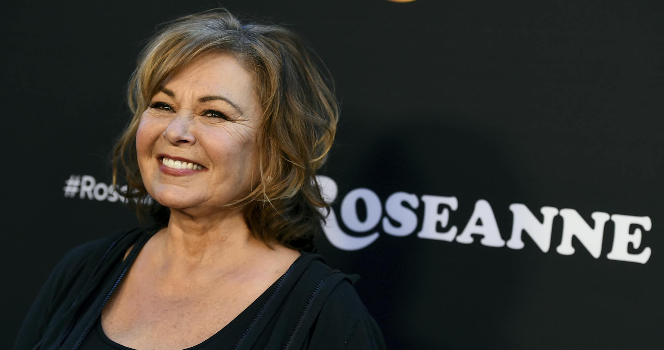 FILE - In this March 23, 2018, file photo, Roseanne Barr arrives at the Los Angeles premiere of "Roseanne" on Friday in Burbank, Calif. Barr has apologized for suggesting that former White House adviser Valerie Jarrett is a product of the Muslim Brotherhood and the &#xec;Planet of the Apes.&#xee; Barr on Tuesday, May 29, tweeted that she was sorry to Jarrett &#xec;for making a bad joke about her politics and her looks.&#xee; Jarrett, who is African-American, advised Barack and Michelle Obama. (P