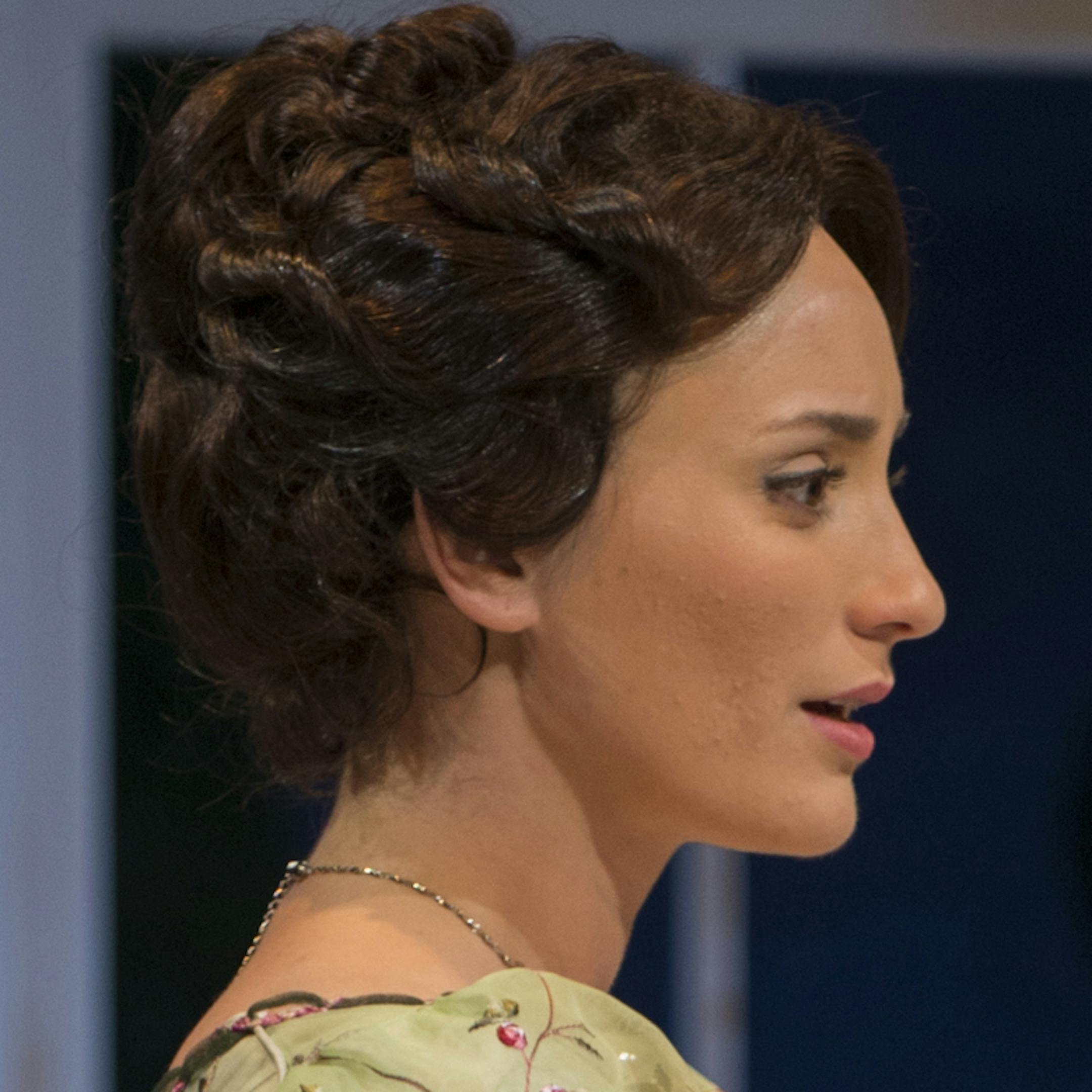 Christine Weber (Jane) and Ashley Rose Montondo (Elizabeth Bennet) in the Guthrie Theater's production of Pride and Prejudice, by Jane Austen, adapted by Simon Beale. Directed by Joe Dowling, set design by Alexander Dodge, costume design by Mathew LeFebvre and lighting design by Phillip S. Rosenberg. July 12, 2013 - August 31, 2013 on the Wurtele Thurst Stage at the Guthrie Theater, Minneapolis. Photo by Michael Brosilow.