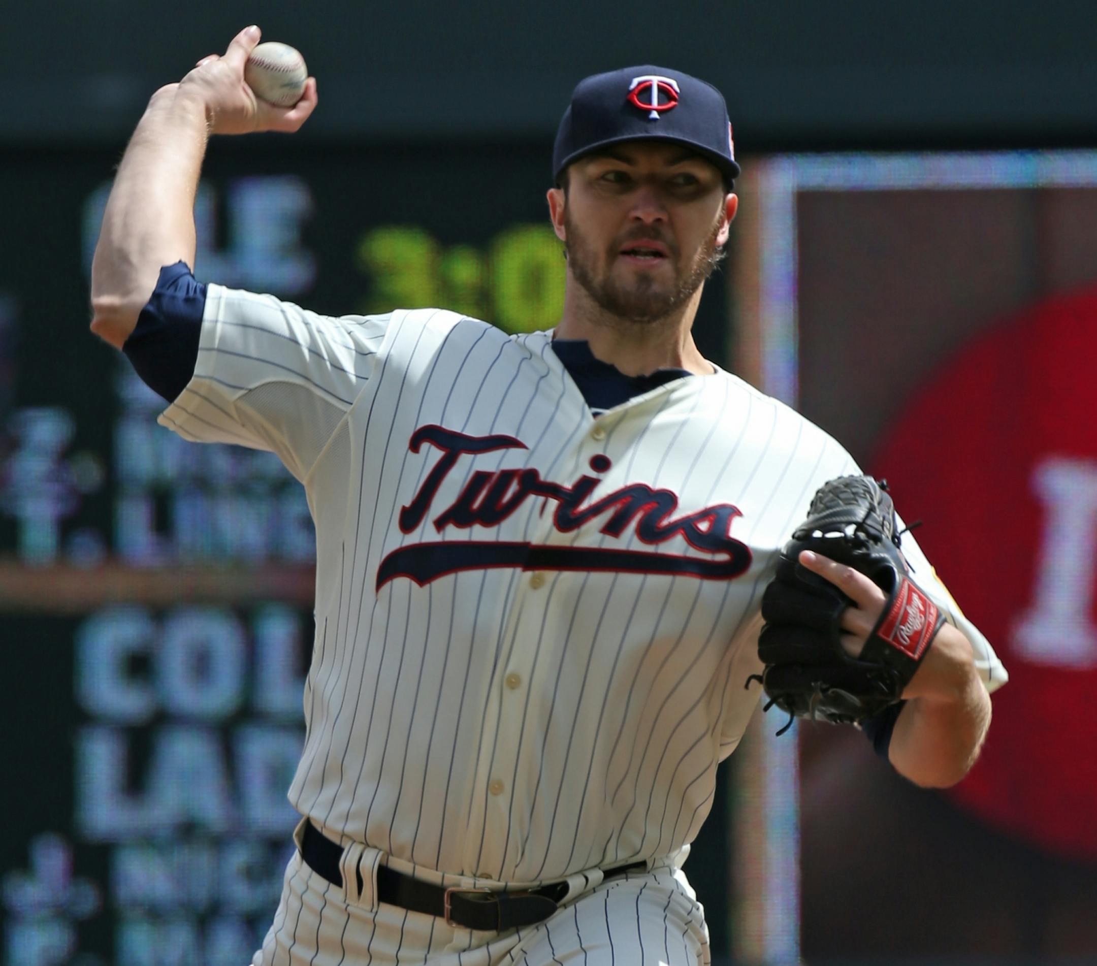 (left to right) Twins Phil Hughes pitched to Detroit in early innings.