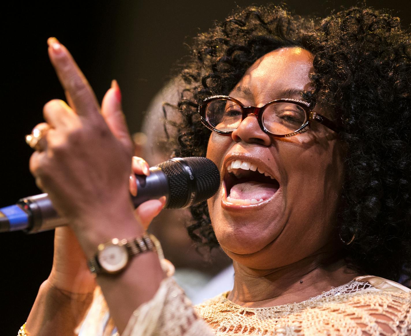 Yolande Bruce, a member of the Penumbra Theatre Company performs the song "Takin' It To The Streets" by the Doobie Brothers after the State of the City address. ] (Leila Navidi/Star Tribune) leila.navidi@startribune.com BACKGROUND INFORMATION: St. Paul Mayor gives his 2016 State of the City address Tuesday, April 19, 2016 at the Penumbra Theatre in St. Paul. Interspersed in the speech were performances of excerpts of August Wilson plays.