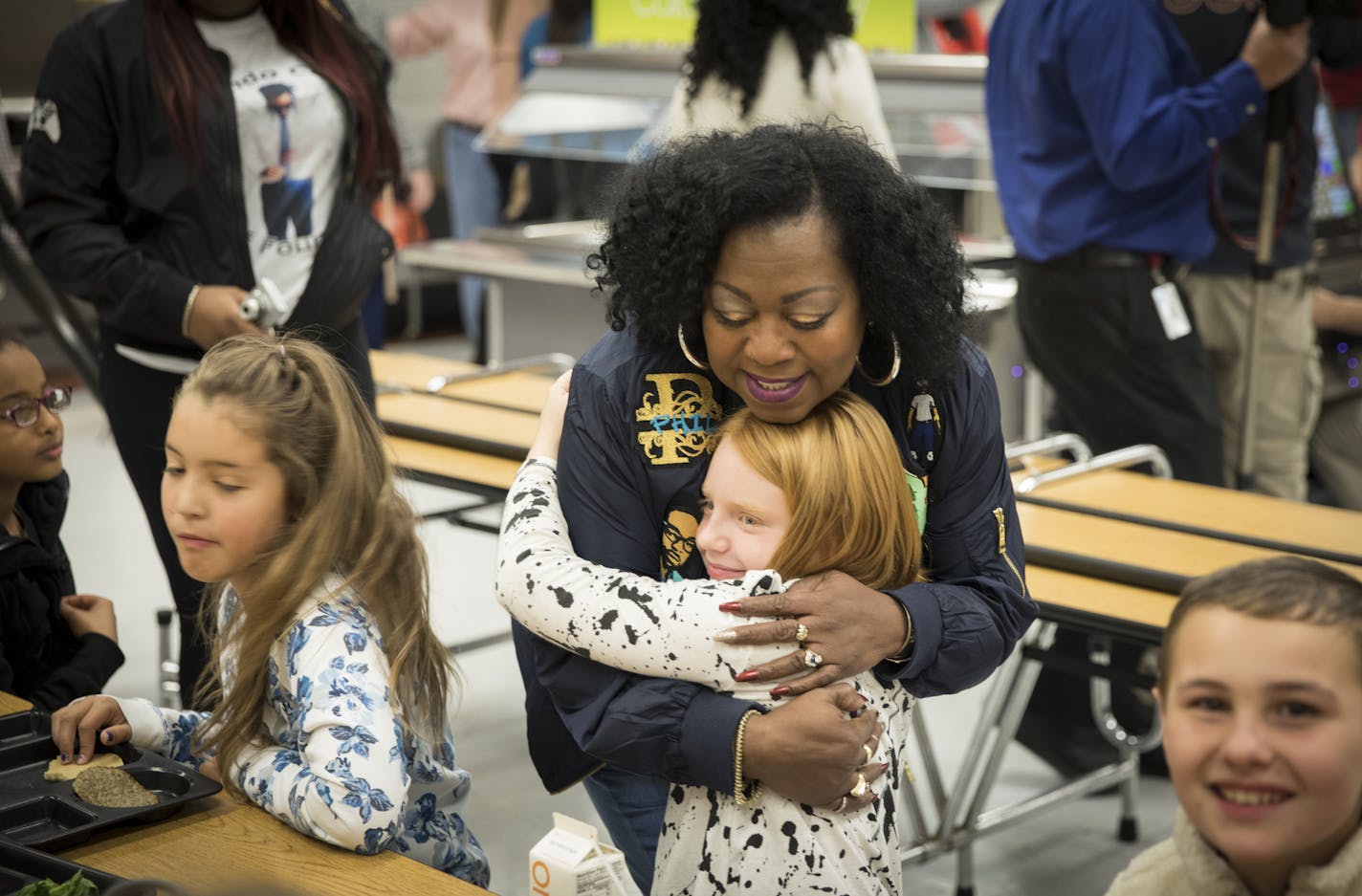 Valerie Castile, mother of Philando Castile, greeted children in the lunchroom he worked at as she arrived to announce a donation from the "Philando Feeds the Children" effort at J.J. Hill Montessori in St. Paul, Minn., on Friday, October 13, 2017.