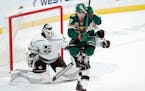 Wild rookie Kirill Kaprizov jumped to clear the way for a shot against Kings goalie Calvin Petersen in the third period Tuesday night. The Kings won 2