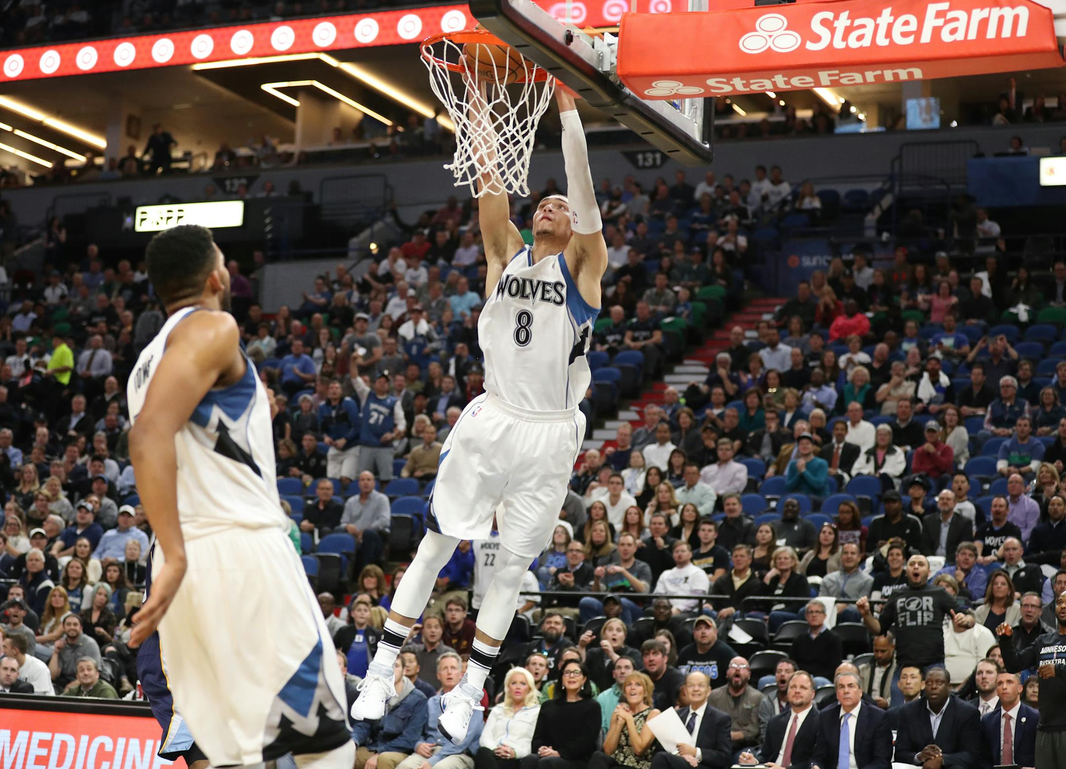 Minnesota Timberwolves guard Zach LaVine (8) finishes off the ally-oop during the first half.