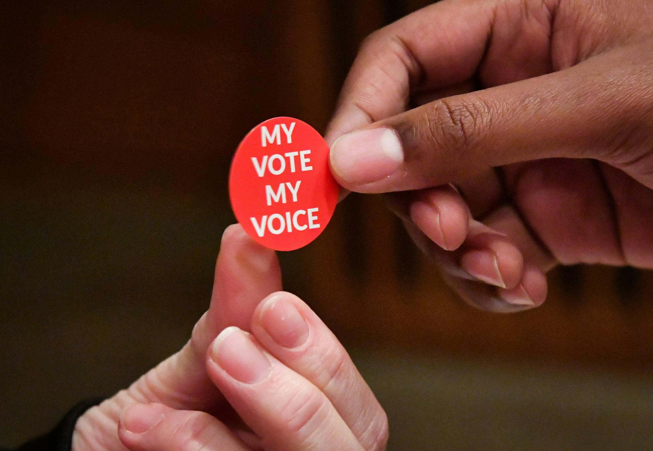 Students received MyVote My Voice stickers after voting in mock election day at Como Park HS. ] GLEN STUBBE * gstubbe@startribune.com Tuesday, October 25, 2016 this time: It's mock election day at Como Park HS, the perfect time to watch democracy in action and see how kids are responding to the polarized election. Kids will be coming into "polling places" to cast votes, part of a statewide high school mock presidential election. The release says to get to Como Park HS at 10:30 for interviews; ki