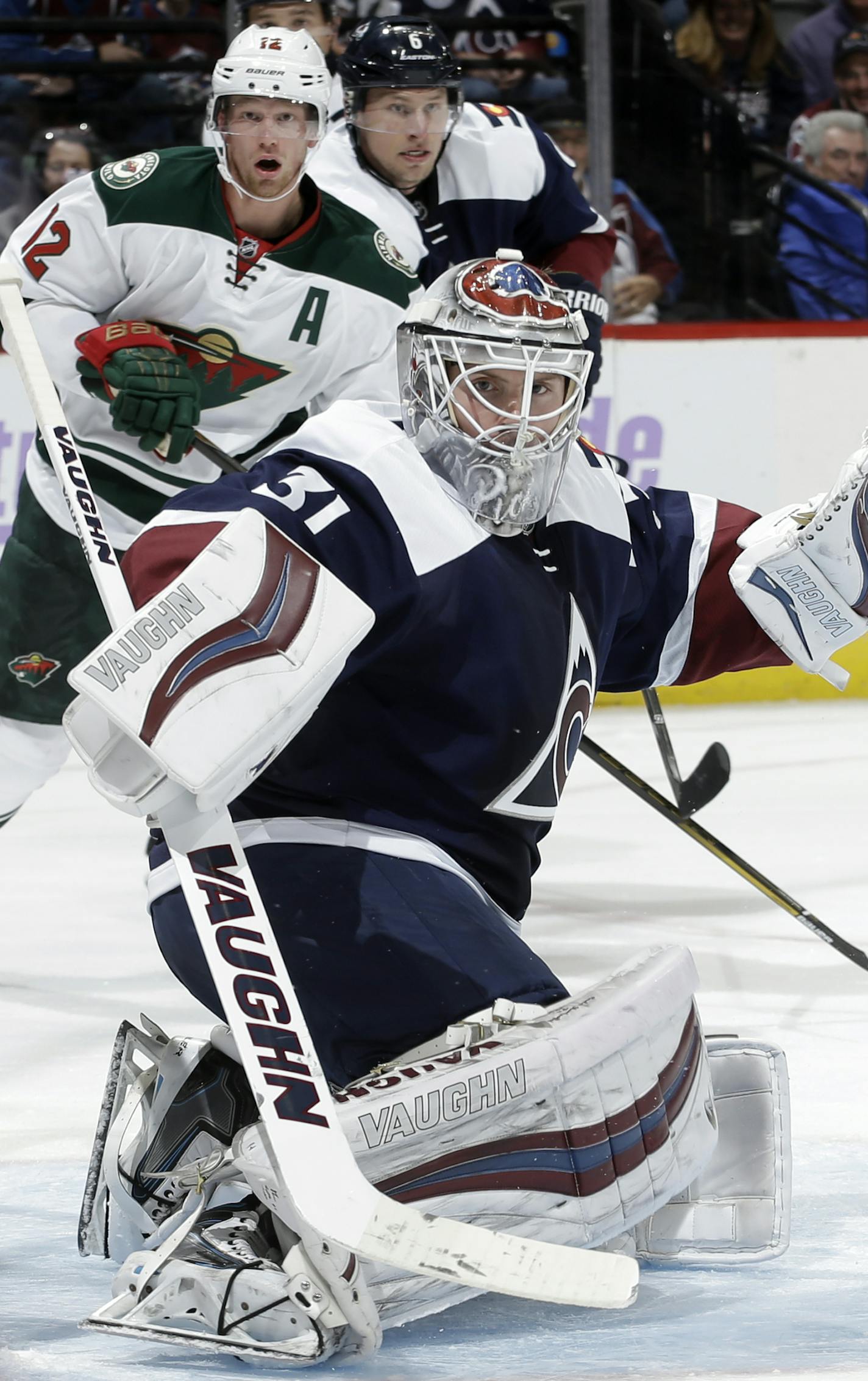 Colorado Avalanche goalie Calvin Pickard eyes the puck during the second period of an NHL hockey game against the Minnesota Wild, Saturday, Nov. 5, 2016, in Denver. (AP Photo/Jack Dempsey)