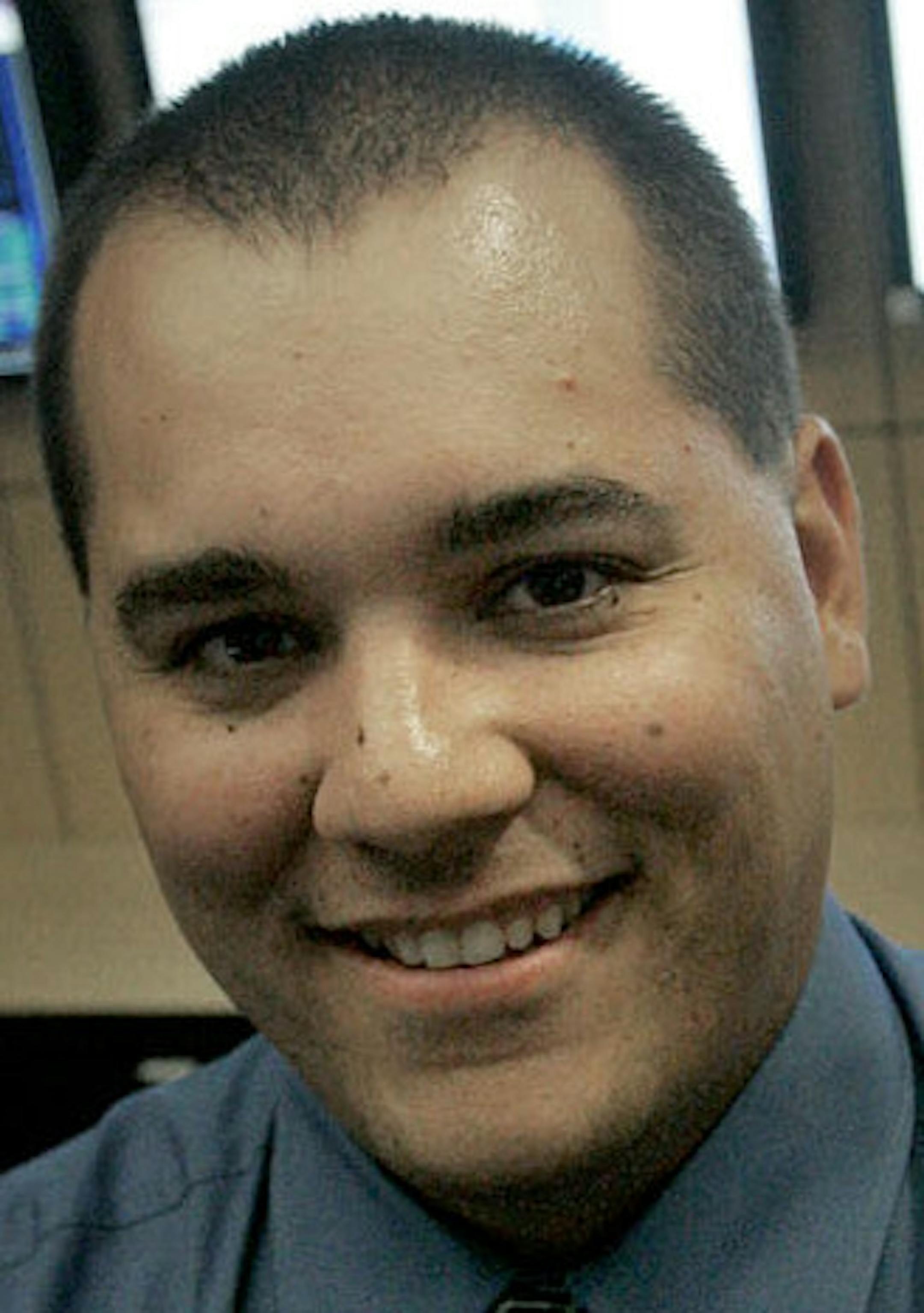 ELIZABETH FLORES • eflores@startribune.com June 15, 2007 - Eden Prairie, MN - Eric Lucero is Metro State's first computer forensics sciene major this spring, who got a job at data recovery company Kroll Ontrack beffore he had even graduated. Here, Lucero stood in front of the main service operations center.