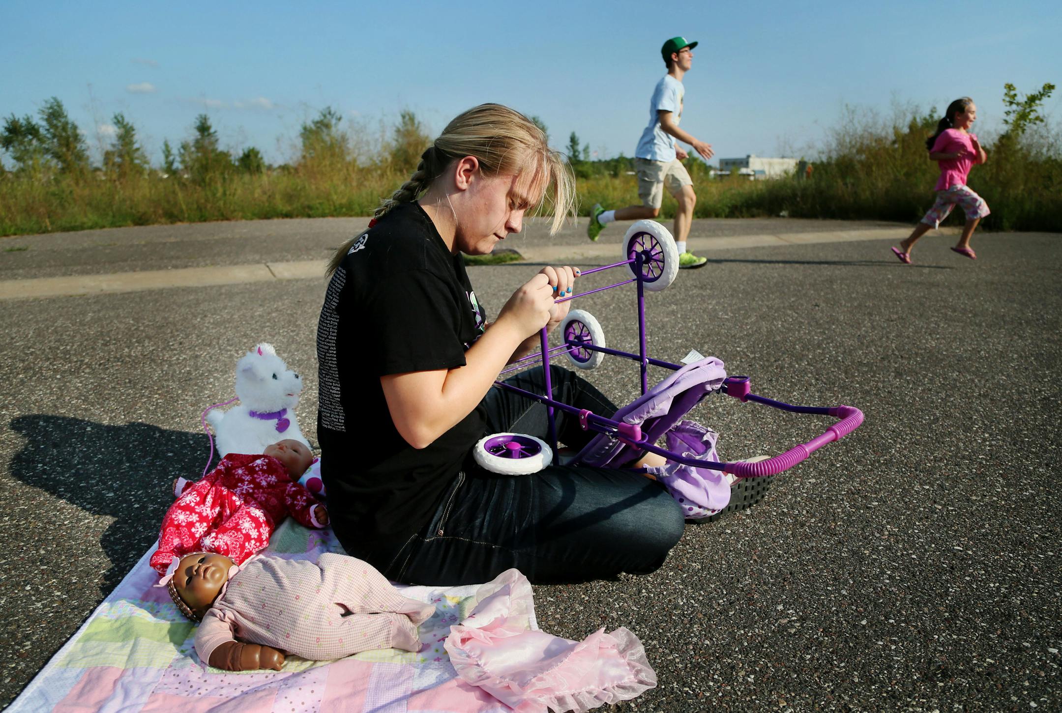 Brianna Hoover and her twin brother, Cory, in background, both have fetal alcohol syndrome, but Cory jumped to the front of the aid line when he gashed his arm.