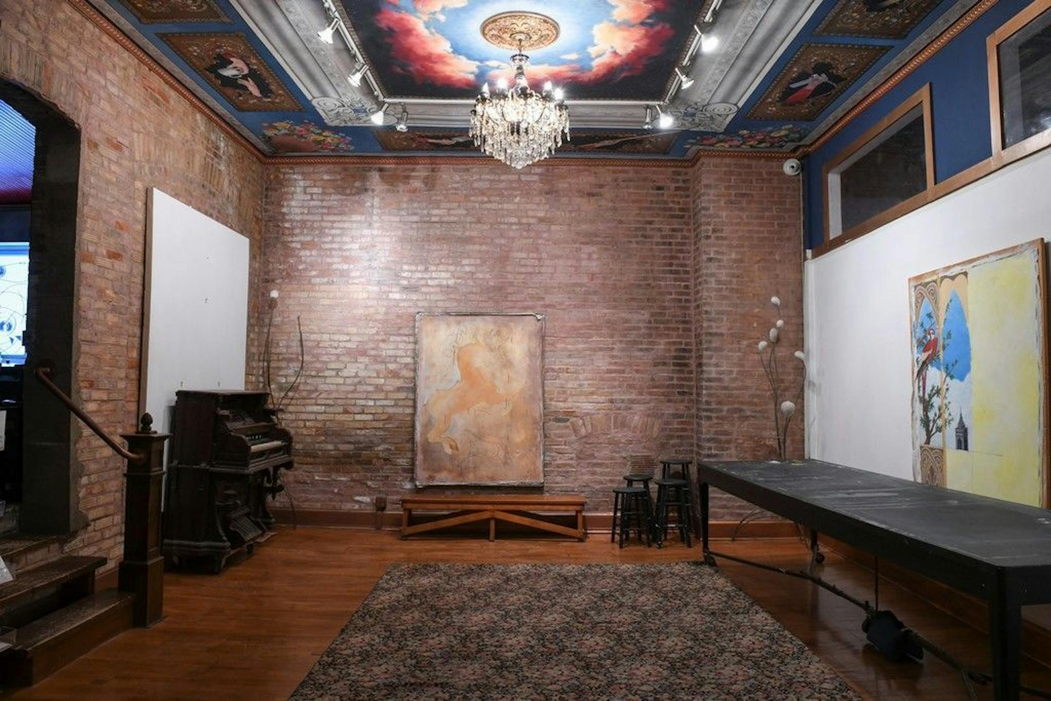 The gallery with hand-painted ceiling in Derby's commercial art studio, Artista Bottega, in the same building as her home.
