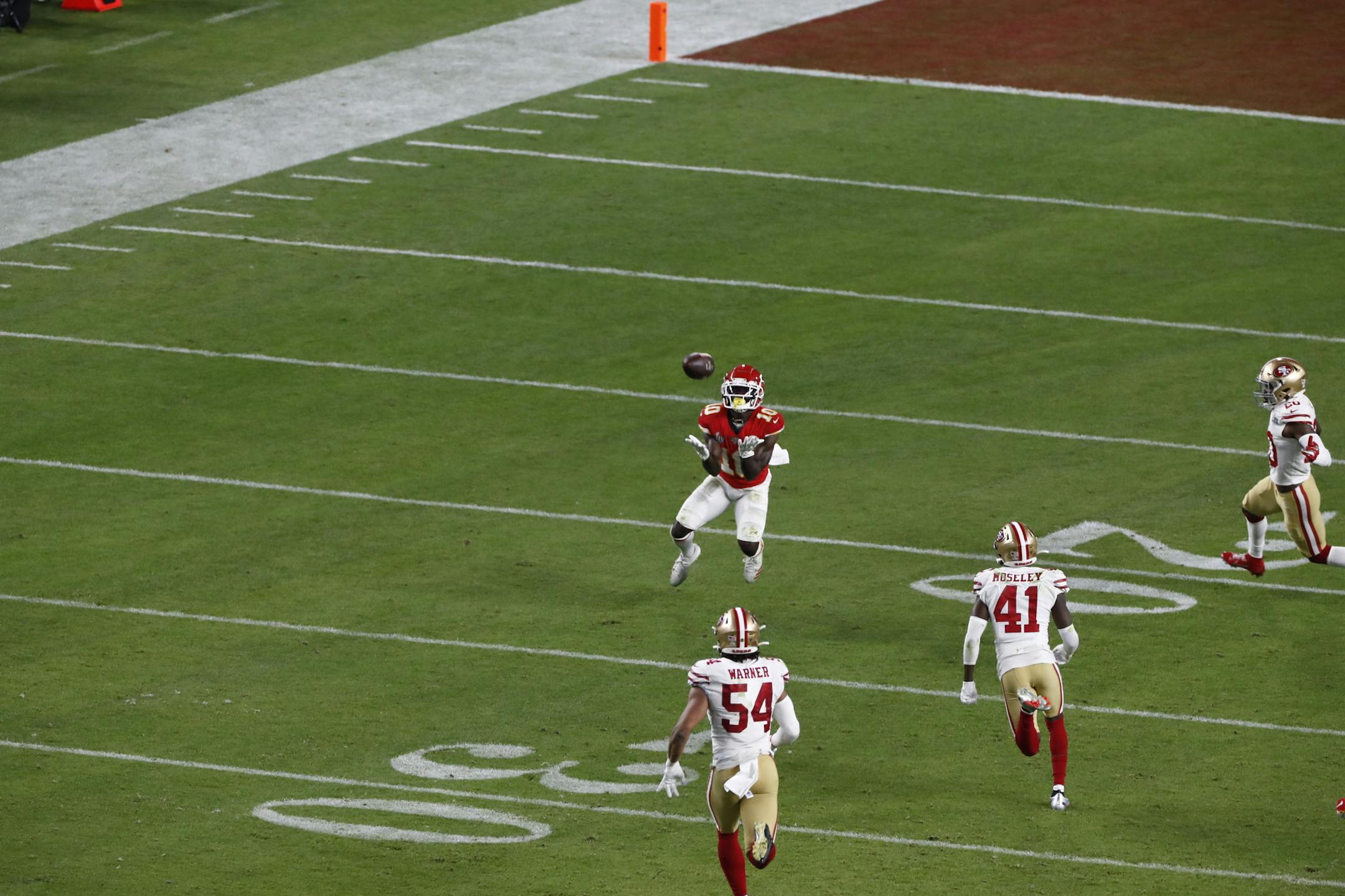 Kansas City Chiefs Tyreek Hill catches a 44 yard pass in the fourth quarter of Super Bowl LIV at Hard Rock Stadium in Miami Gardens, Fla. on Sunday, Feb. 2, 2020. The Chiefs won the Super Bowl for the first time in 50 years, defeating the San Francisco 49ers, 31-20. (Scott McIntyre/The New York Times)