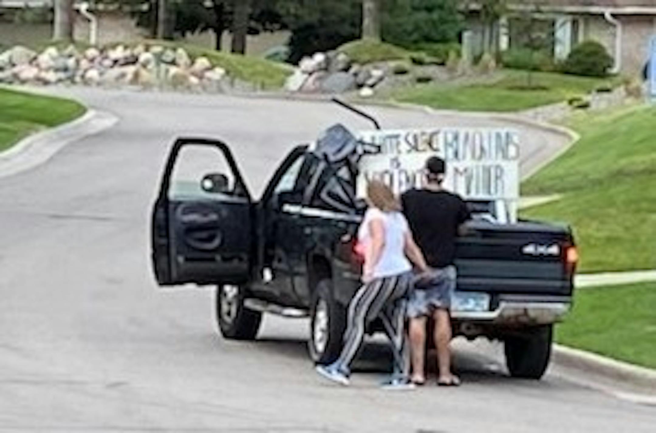 Roseville police are seeking the public's help in identifying the man and woman seen stealing yard signs in this photo. They were taken June 19.