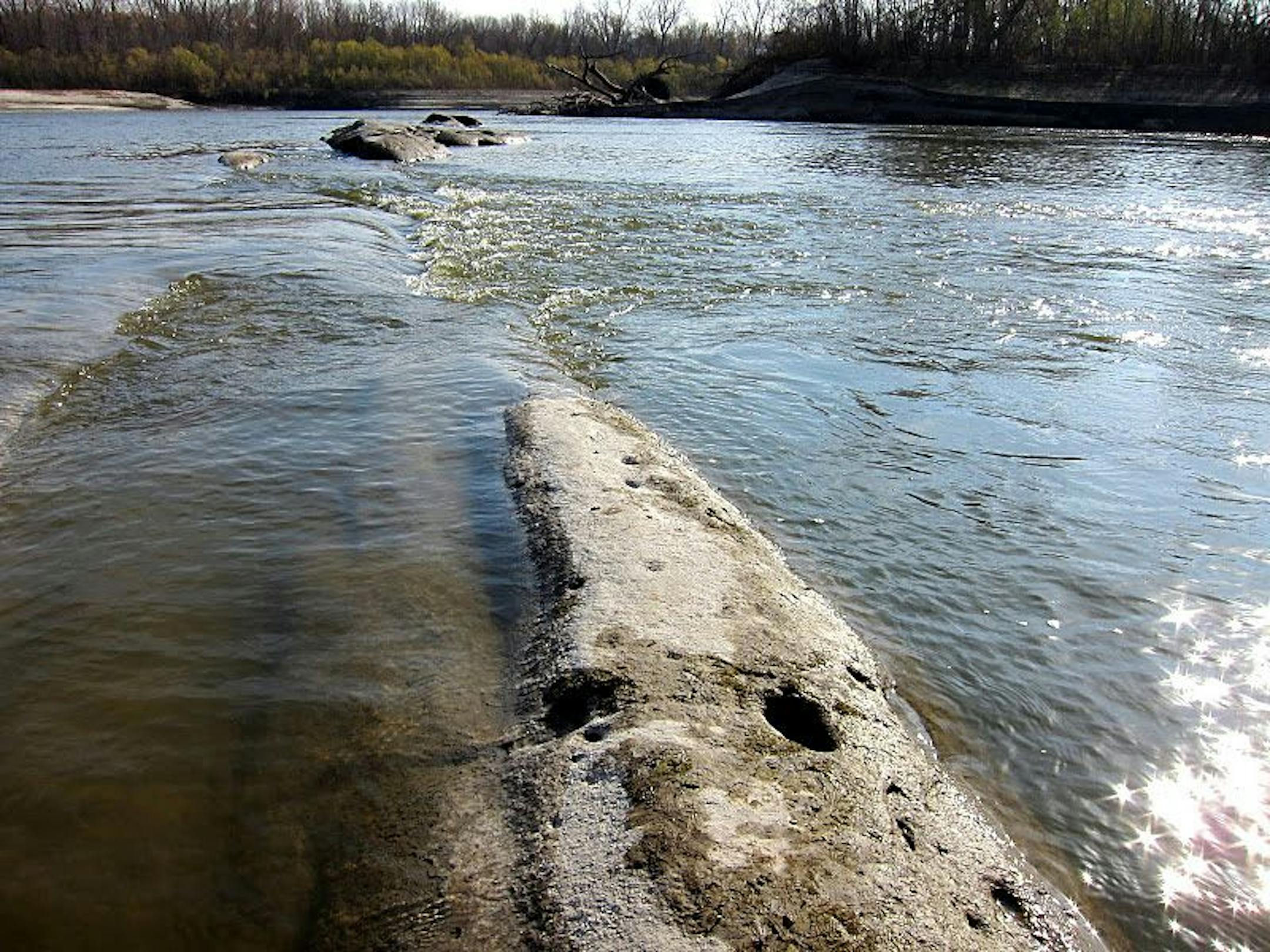 Unusually low water levels have exposed sandstone ledges and rapids near Carver that are rarely seen along the Minnesota River. PHOTO CREDIT: Jerrod Larson