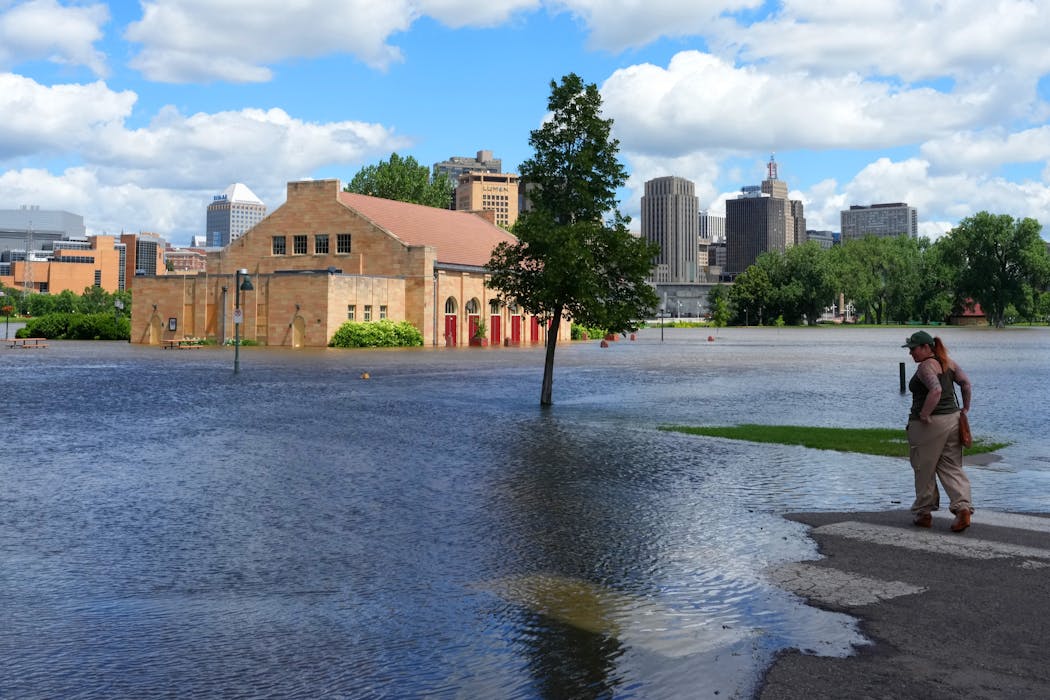 The Mississippi River floods the Clarence W. Wigington Pavilion Wednesday at Harriet Island Regional Park in St. Paul.