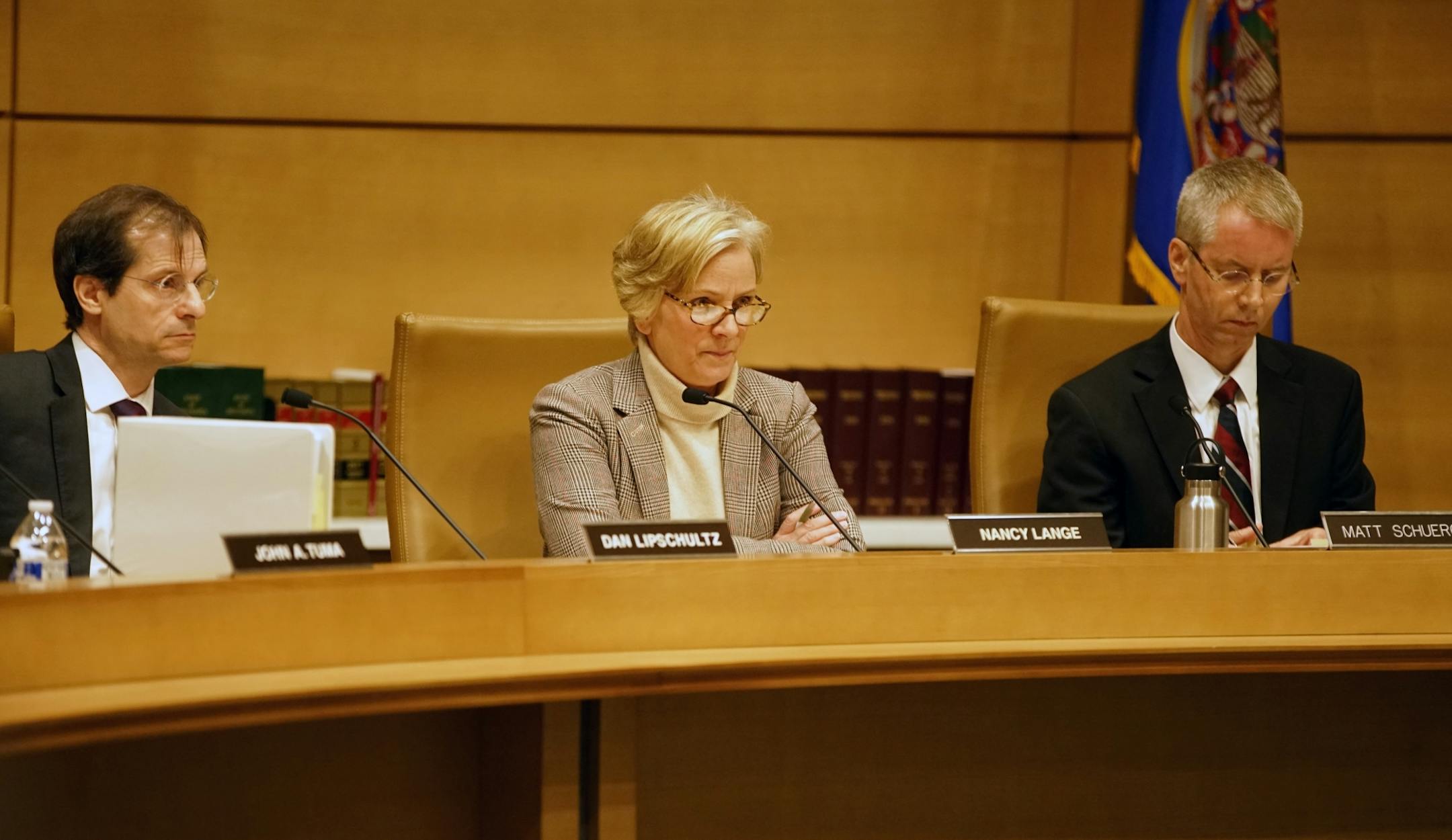 Commisioner Nancy Lange was not pleased by the disruptive objections of several environmentalists.from MN350, a group fighting climate change.