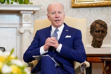 President Joe Biden sits in the Oval Office of the White House, on March 4 in Washington.  