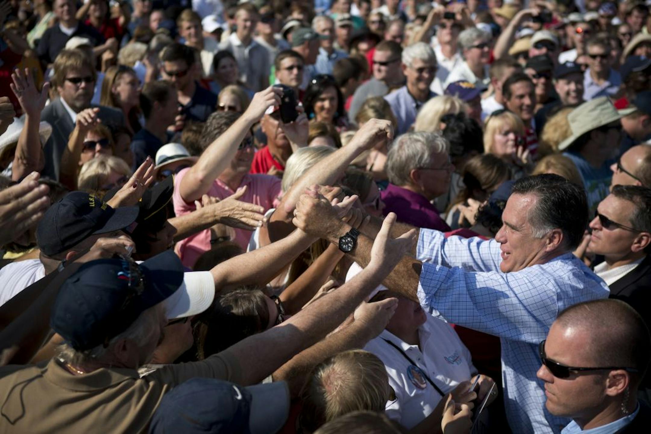 Mitt Romney, the Republican presidential candidate, greets attendees during a campaign event at Jacksonville Landing in Jacksonville, Fla., Sept. 1, 2012. Romney could win Florida, North Carolina, Virginia, New Hampshire, Indiana, Iowa and Nevada � all states carried by President Barack Obama in 2008 � and still fall short without Ohio and its 18 electoral votes.