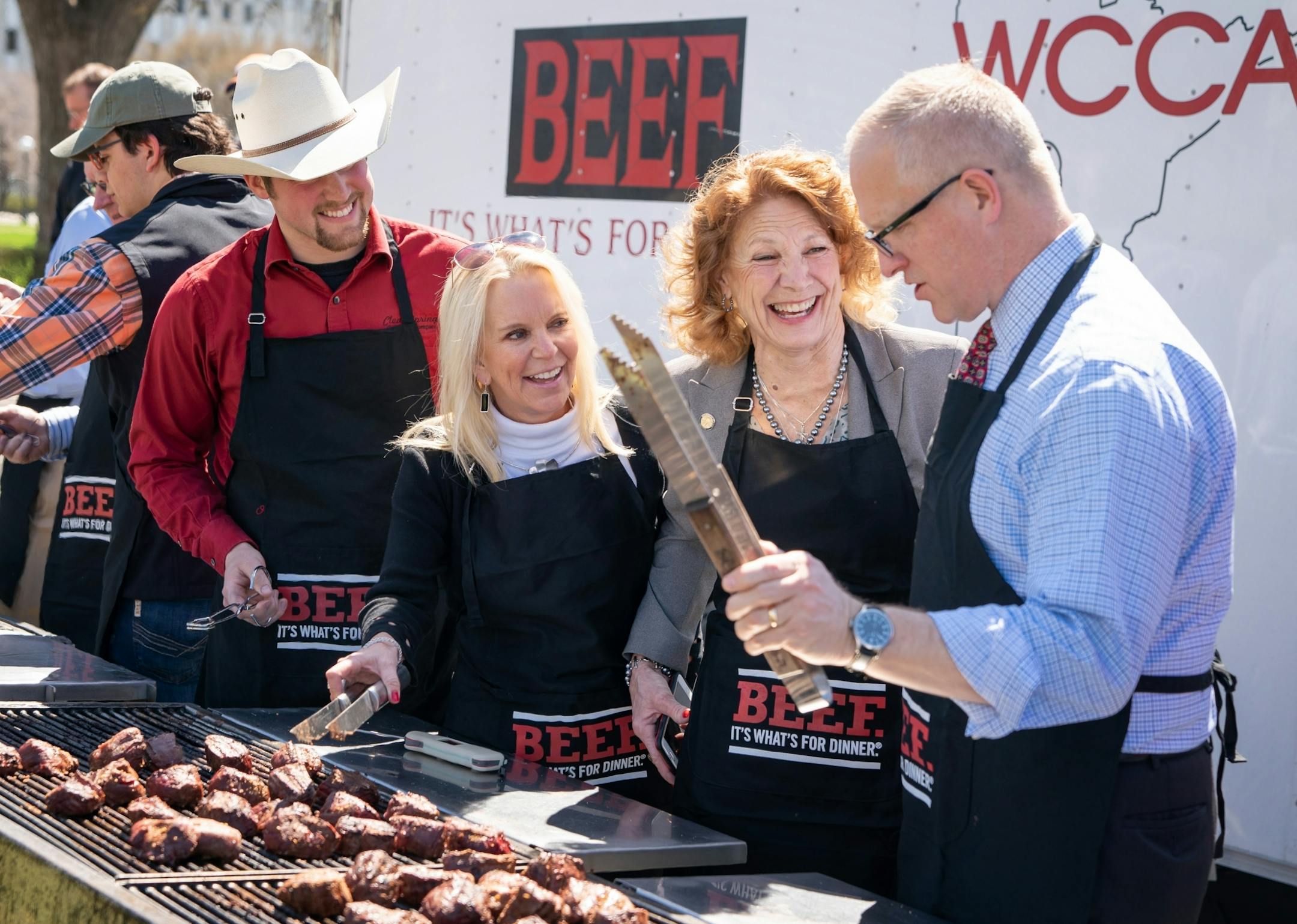 Jim Nash was cracking jokes with State Senators Karin Housley and Carrie Ruud as they took turns grilling 4-oz beef tenderloins at the Minnesota State Cattlemen's Association Steak on a Stick event at the Capitol.