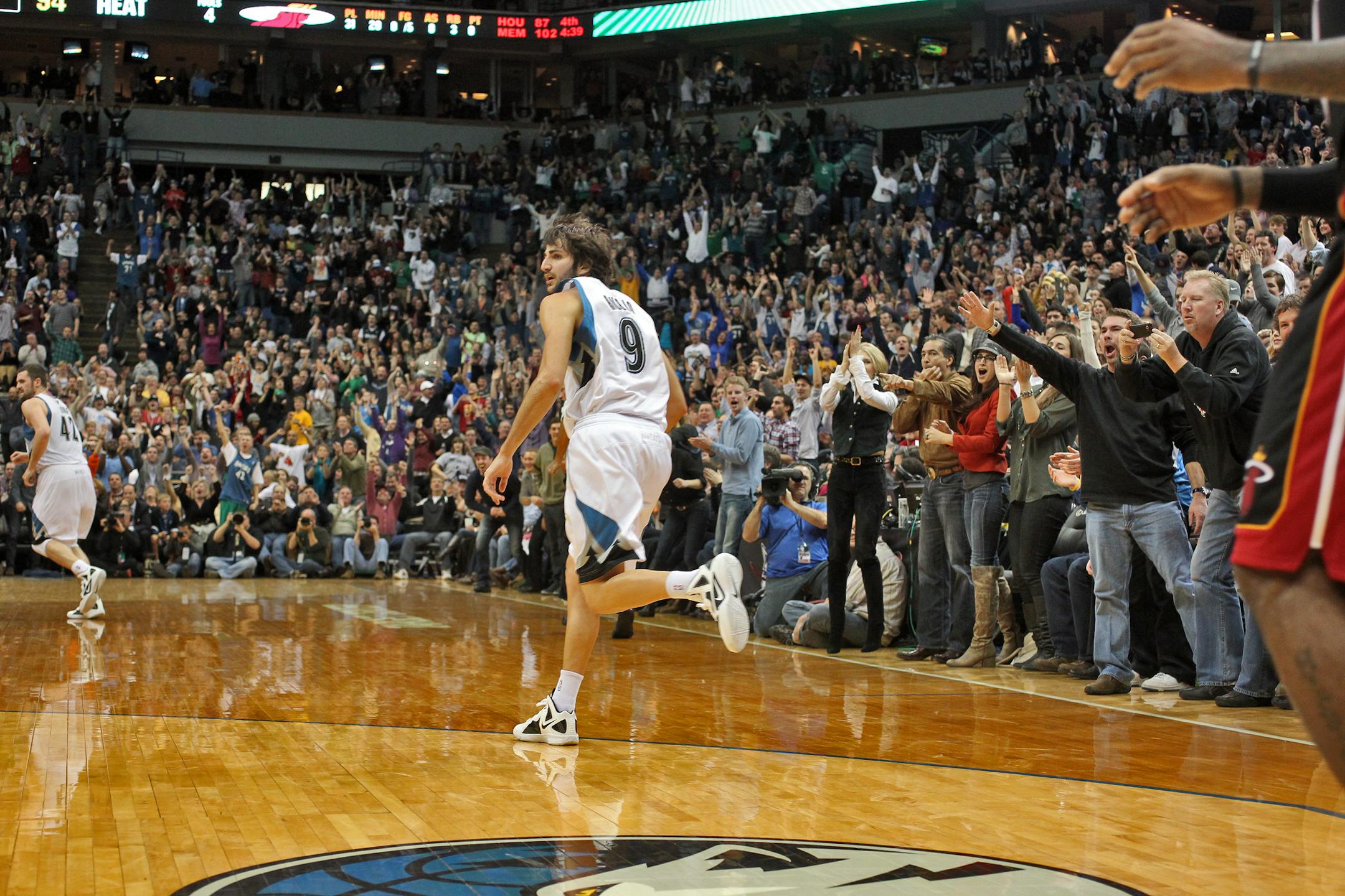 Wolves Ricky Rubio headed downcourt to the crowd's delight after he hit a three point shot from the corner to put the Wolves ahead of the Heat late in the game. ](MARLIN LEVISON/STARTRIBUNE(mlevison@startribune.com (cq all names program.)