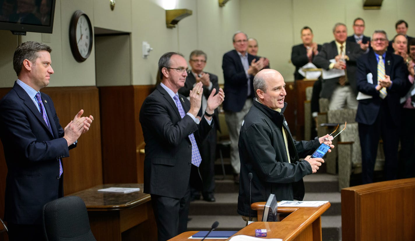 John Burkel was invited to speak to the House Republican caucus at the state legislature to give representatives a first person account of what farmers are facing during the avian flu crisis. He received a standing ovation and answered questions from the members. Behind him are House Speaker Kurt Daudt and his local representative Dan Fabian, R-Roseau. ] GLEN STUBBE * gstubbe@startribune.com Friday, April 24, 2015 MN turkey farmer, John Burkel, who's flock was wiped out by the bird flu.