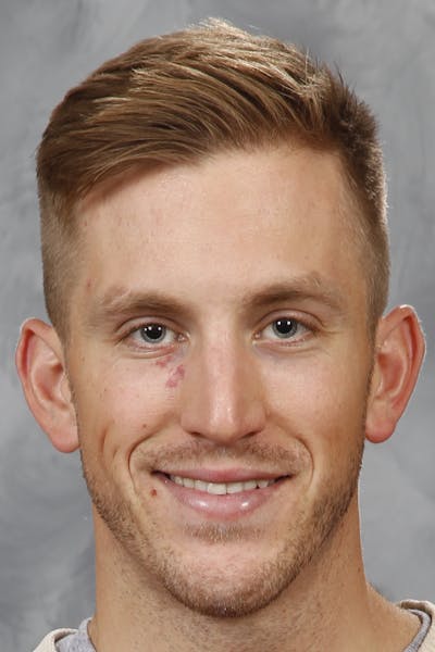 ST. PAUL, MN - SEPTEMBER 18: Jordan Schroeder #10 of the Minnesota Wild poses for his official headshot for the 2014-2015 season on September 18, 2014