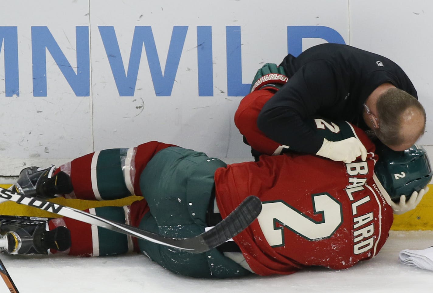 Keith Ballard was injuried in the second period and was helped off the ice.] in the Wild game at the Xcel Center against the New York Islanders.Richard Tsong-Taatarii/ rtsong- taatarii@startribune.com