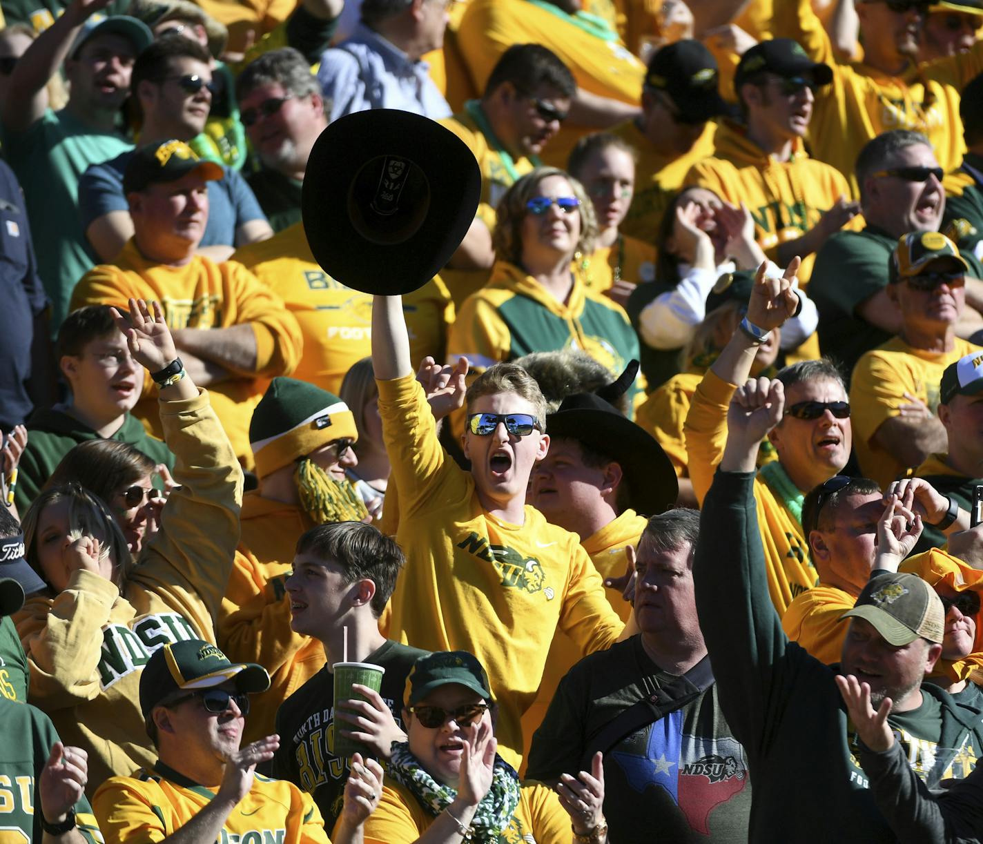 North Dakota State fans cheer during the second half of the FCS championship NCAA college football game against Eastern Washington, Saturday, Jan. 5, 2019, in Frisco, Texas. North Dakota State won 38-24. (AP Photo/Jeffrey McWhorter) ORG XMIT: TXJM123