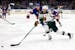 Wild left wing Matt Boldy skates with the puck past New York Islanders defenseman Scott Mayfield in January.