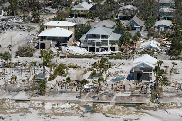 Damaged and missing homes are seen in the wake of Hurricane Ian, Thursday, Sept. 29, 2022, in Fort Myers Beach, Fla. 