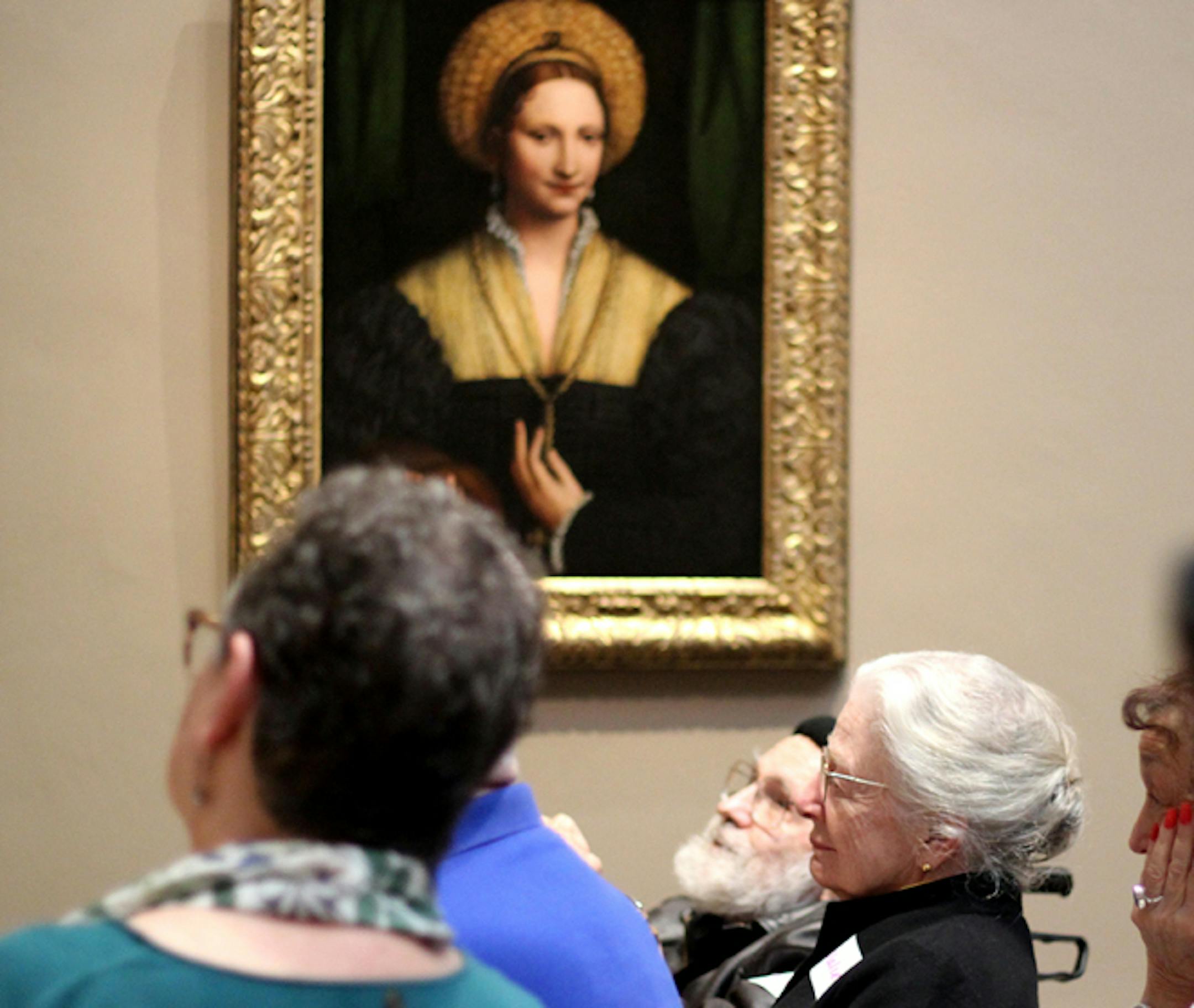 A group of older adults and their caregivers analyze and discuss works of art on March 5, 2018, as part of the National Gallery's Just Us program in Washington, D.C. (Lynne Shallcross/KHN/TNS) ORG XMIT: 1230376