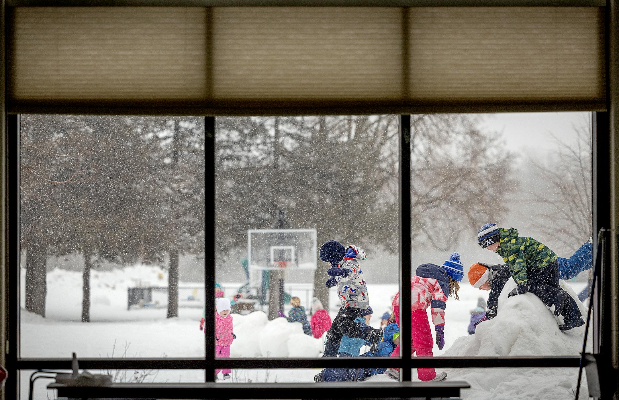 Children play during recess at St. Therese Catholic School.