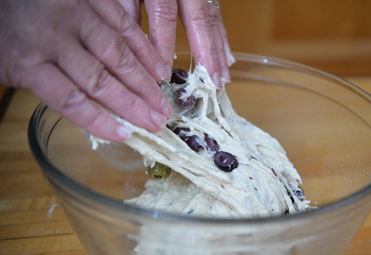 Gently stretch and fold the dough every fifteen minutes over an hour's time to allow dough to rise. ] (SPECIAL TO THE STAR TRIBUNE/BRE McGEE)