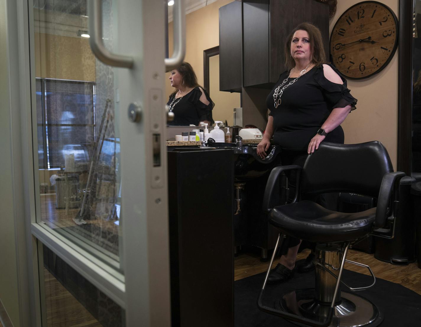 Stylist Penelope Burau at Salon Concepts in Chanhassen has rescheduled customers several times in anticipation that hair salons will reopen in Minnesota.