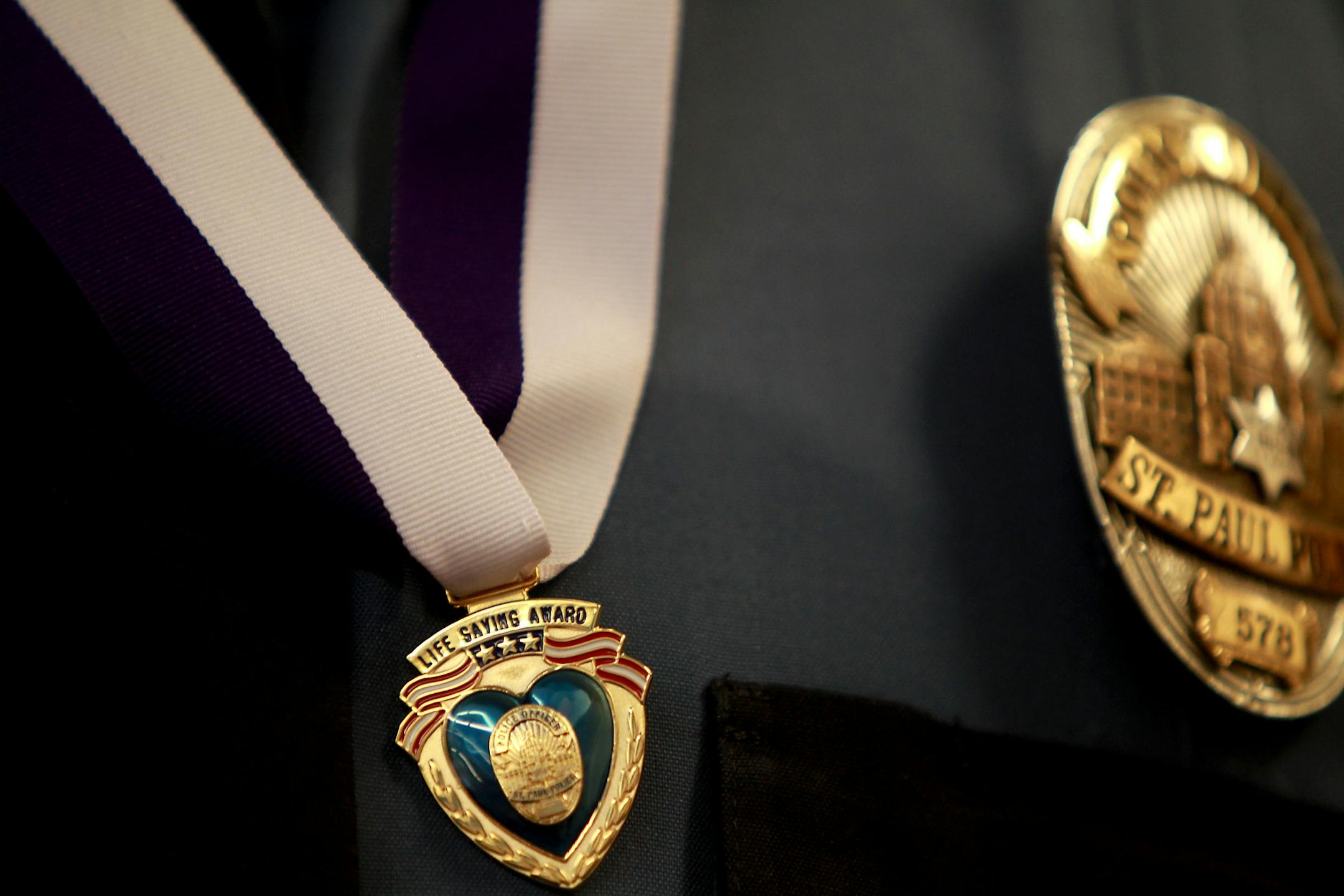 St. Paul Police Officer John McManus proudly wore his Chief�s Award for Valor during an awards ceremony at St. Paul's West District Headquarters, Wednesday, January 11, 2012. (ELIZABETH FLORES/STAR TRIBUNE) ELIZABETH FLORES � eflores@startribune.com