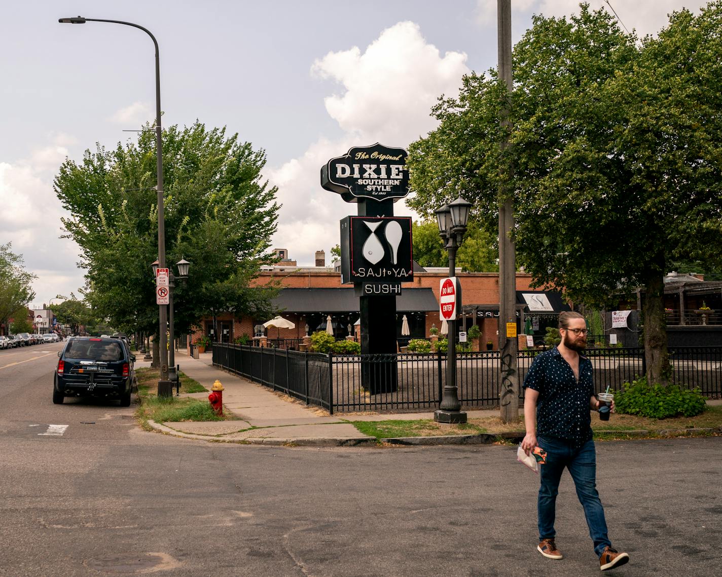 A person walks past Dixie's On Grand in St. Paul in August.